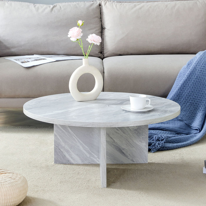 Versatile Round Coffee Table For Various Interior Styles