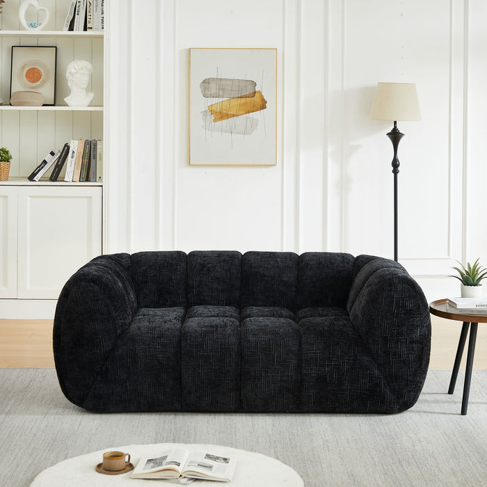 Quilted Cloud Sofa With Rounded Armrests And Piano Key Backrest Design