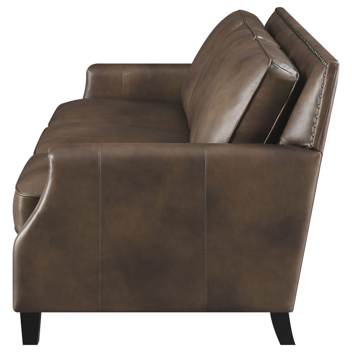 Gunderson - Upholstered Recessed Sofa In Sugar Leather With Tapered Legs - Brown