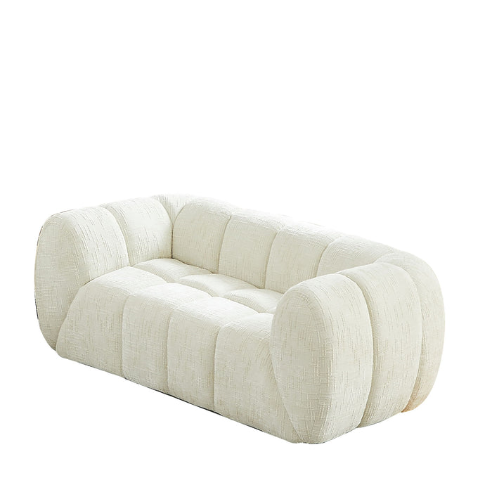 Quilted Cloud Sofa With Rounded Armrests And Piano Key Backrest Design