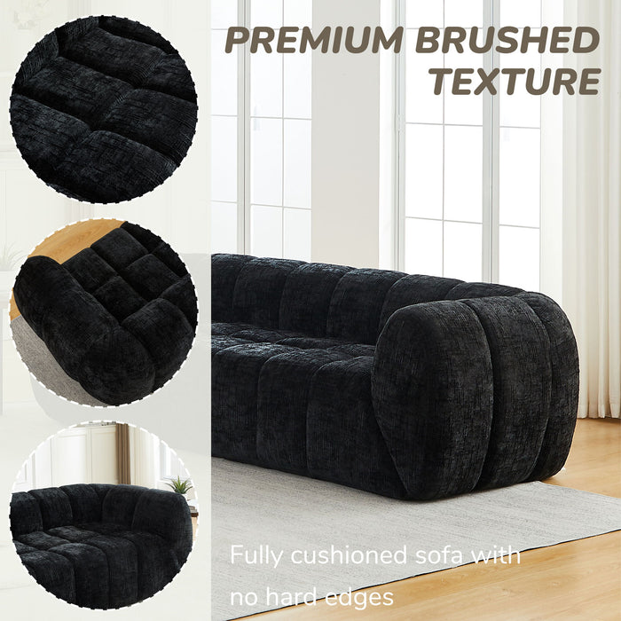 Quilted Cloud Sofa With Rounded Armrests And Piano Key Backrest Design