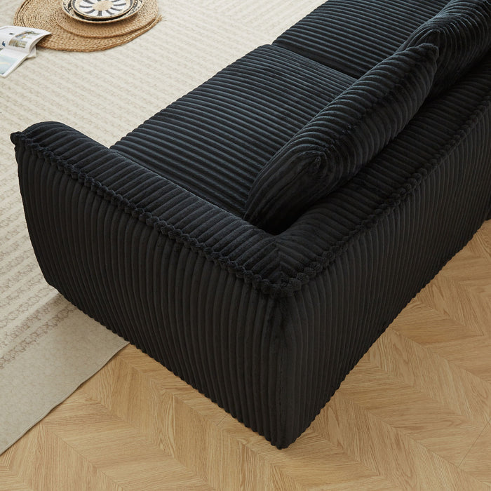 Minimalist Sofa With Curved Lines And Horn Shaped Throw Pillows