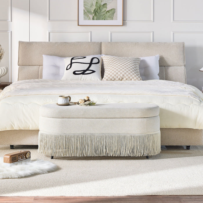 Oval Upholstered Storage Ottoman With Fringe Trim & Lift Top Lid