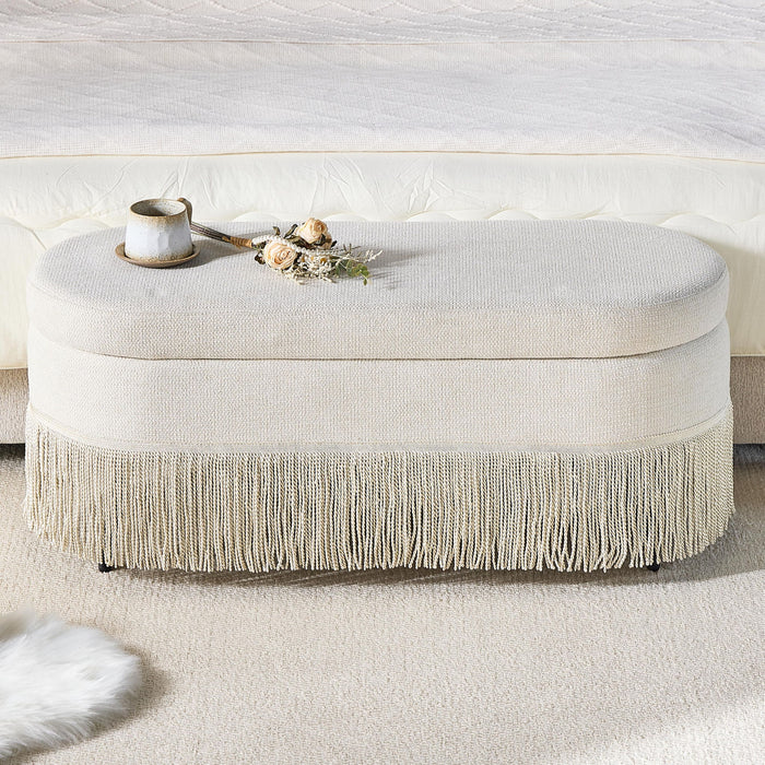 Oval Upholstered Storage Ottoman With Fringe Trim & Lift Top Lid