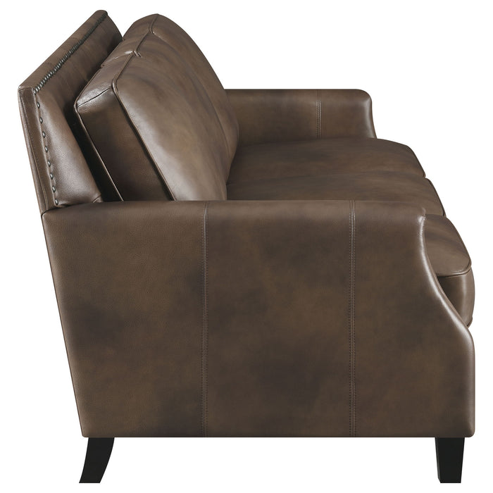 Gunderson - Upholstered Recessed Sofa In Sugar Leather With Tapered Legs - Brown
