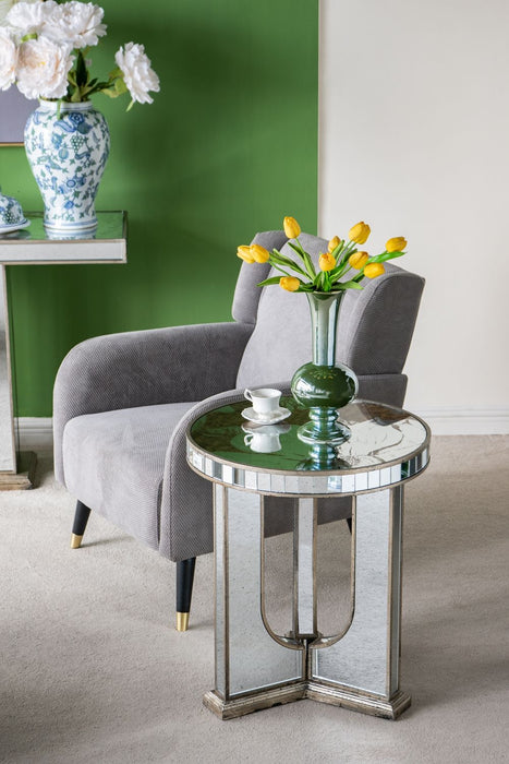 Round Table With Elegant Foral Design And Mirrored