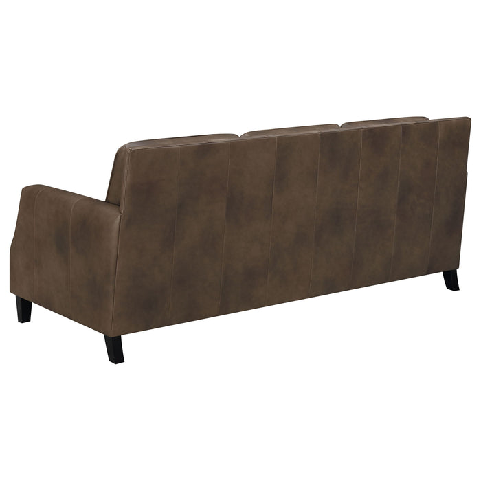 Gunderson - Upholstered Recessed Sofa In Sugar Leather With Tapered Legs - Brown
