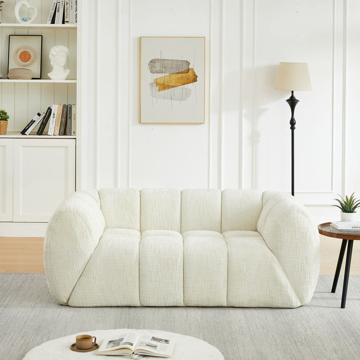 Quilted Cloud Sofa With Rounded Armrests And Piano Key Backrest Design