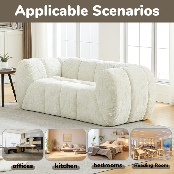 Quilted Cloud Sofa With Rounded Armrests And Piano Key Backrest Design