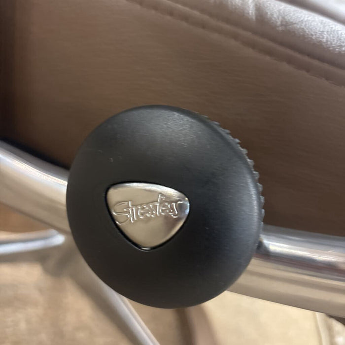 Brown Stressless Recliner+Ottoman (TIH)