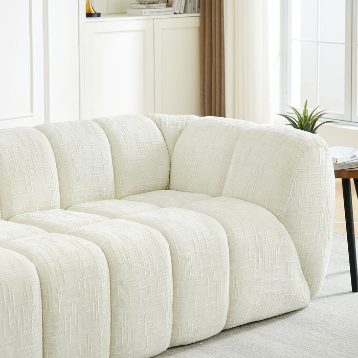Quilted Cloud Sofa With Rounded Armrests And Piano Key Backrest Design