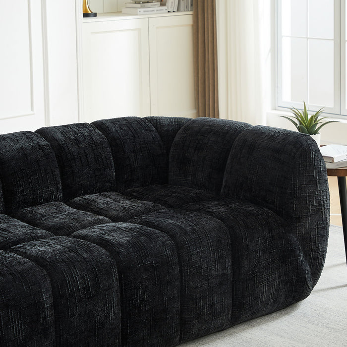 Quilted Cloud Sofa With Rounded Armrests And Piano Key Backrest Design