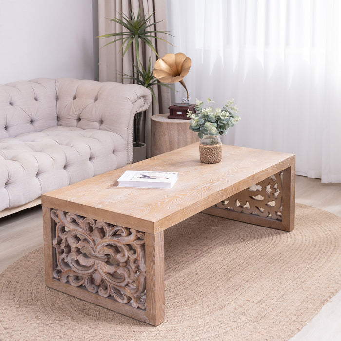 Rustic Carved Wood Coffee Table, Handcrafted Look With Ornate Side Panels