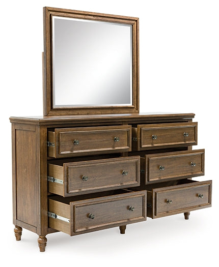 Sturlayne King Upholstered Panel Bed with Mirrored Dresser and Nightstand