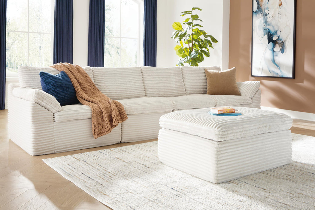 Ashley Express - Fannin 4-Piece Sectional with Ottoman