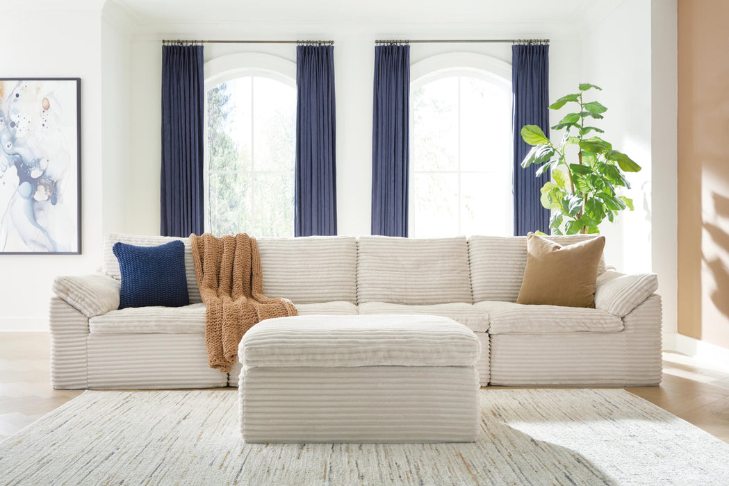 Ashley Express - Fannin 4-Piece Sectional with Ottoman