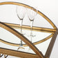 Carola Gold Frame Two-Tier Glass Shelves w/Stemware Holder Bar Cart