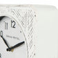 Karl 8.0L x 2.8W x 8.8H Rustic White Iron Rounded Square Table Clock